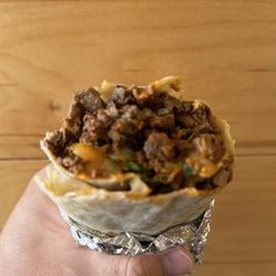 King Taco - All meat carne asada burrito with onion and cilantro