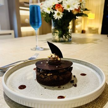 Saffiani - Desert! Chocolate Tort with a nut brittle layer & salted caramel. What a wonderful way to end an evening! - Personal Chefs Near Me Saffiani - Desert! Chocolate Tort with a nut brittle layer & salted caramel. What a wonderful way to end an evening! - Personal Chefs Near Me