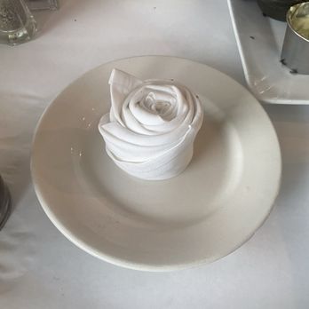 Sun Ray Grill - a white plate with a napkin on it - Diners Near Me - Gretna, Louisiana Sun Ray Grill - a white plate with a napkin on it - Diners Near Me - Gretna, Louisiana