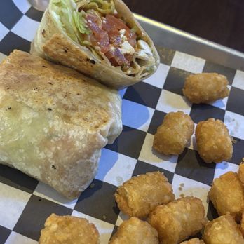 Arctic Wolf Ale House - Buffalo Chicken Wrap (no chicken) with a side of Tator Tots - Sports Bars Near Me - West Dundee, Illinois