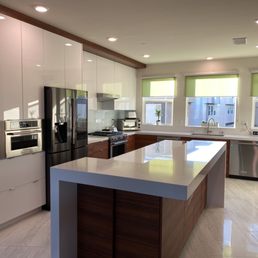 a modern kitchen with stainless steel appliances