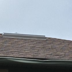 Mitchell Roofing Company - 2nd floor roof vent