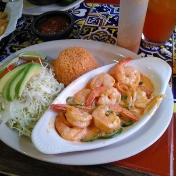 El Rincon Jarocho - Camarónes a la crema. It's shrimp in a garlicky sorta spicy cause with side salad and rice. Not bad for $9 - Seafood Near Me - Fort Worth, Texas El Rincon Jarocho - Camarónes a la crema. It's shrimp in a garlicky sorta spicy cause with side salad and rice. Not bad for $9 - Seafood Near Me - Fort Worth, Texas