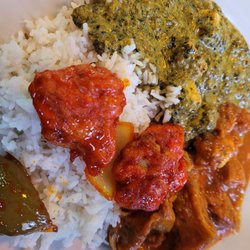 The Lion Indian Cuisine - White rice, Karahi chicken, saag paneer, goat curry