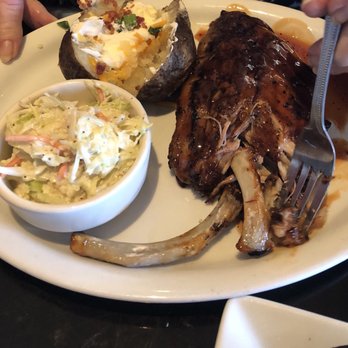 Ruby Tuesday - Loaded baked potato, cole slaw, and half a rack of hickory bourbon ribs. - Burgers Near Me - Alcoa, Tennessee