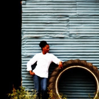 Chef Dawn Burrell Catering - a man leaning on a tire - Street Vendors Near Me - Houston, Texas