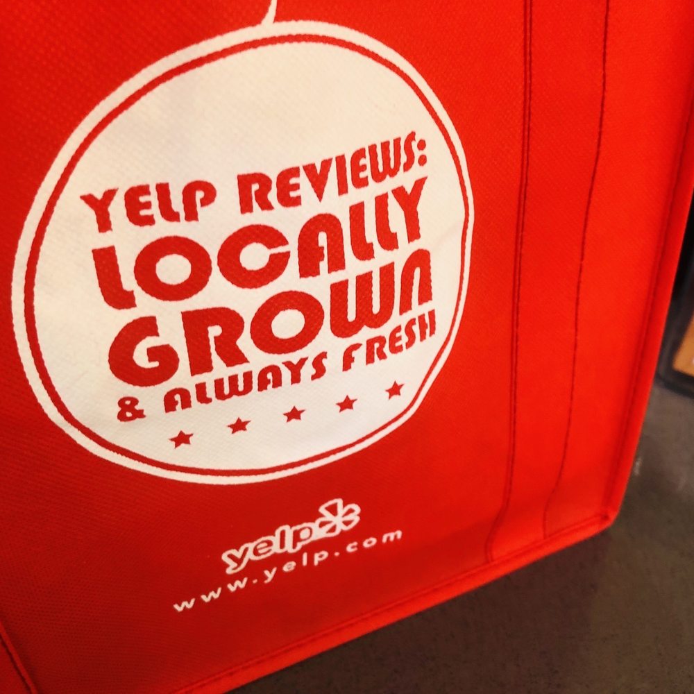 Arepasmanía - a red bag with a logo on it - Venezuelan Near Me - Pembroke Pines, Florida