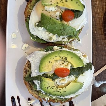 Macondo Calle 8 - Multi grain fried egg avocado, feta, cherry tomatoes, pesto balsamic glaze for decor - Coffee Roasteries Near Me - Miami, Florida Macondo Calle 8 - Multi grain fried egg avocado, feta, cherry tomatoes, pesto balsamic glaze for decor - Coffee Roasteries Near Me - Miami, Florida