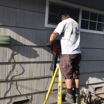 Sconce Electric - Installing eight-foot ground rods for new electrical service.  We have the proper tools to install all 8 feet. - Electricians Near Me