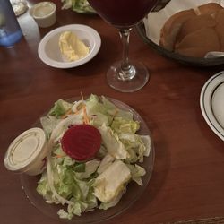 Polinori's Palm Garden Inn - Salad, bread and sangria.