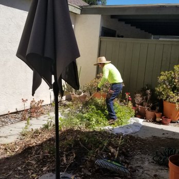 Fernando Landscaping - a man working in his backyard - Landscaping Near Me Fernando Landscaping - a man working in his backyard - Landscaping Near Me