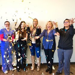 Jenks Pediatric Dental - The team celebrating one year serving our incredible patients in Jenks, OK!