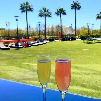 The Delta Bistro & Lounge - Enjoying Pear and Passionfruit Mimosas in the outdoor seating overlooking the Delta. - Lounges Near Me - Stockton, California