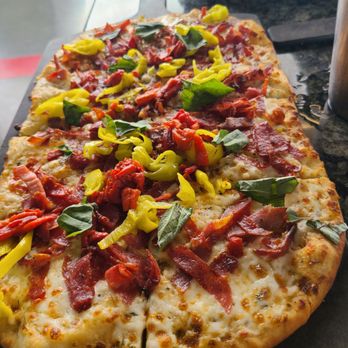 Topgolf - Meatlovers flatbread was very loaded and delicious. - Golf Near Me - San Jose, California Topgolf - Meatlovers flatbread was very loaded and delicious. - Golf Near Me - San Jose, California