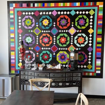 Rise'n Roll Bakery - Artwork on the walls - Amish quilt - Bakeries Near Me - Fishers, Indiana
