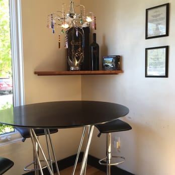 Beau Vigne - a table and chairs in a room - Wineries Near Me - Yountville, California Beau Vigne - a table and chairs in a room - Wineries Near Me - Yountville, California