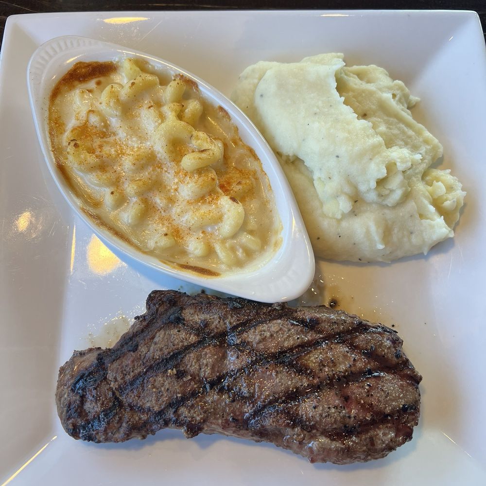 NY 12 oz. New York Strip, Baked Macaroni & Cheese, Mashed Potato NY 12 oz. New York Strip, Baked Macaroni & Cheese, Mashed Potato