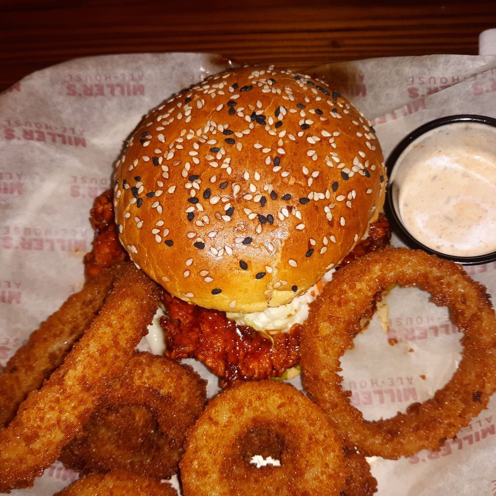Miller's Ale House - Nashville Hot Chicken sandwich, very good but extremely messy! - Sports Bars Near Me - Seminole, Florida Miller's Ale House - Nashville Hot Chicken sandwich, very good but extremely messy! - Sports Bars Near Me - Seminole, Florida