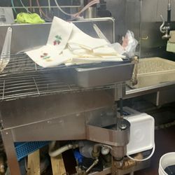Yummy Yummy Asian Bistro - Collecting used napkins and keep them to re-use , direct contact with cooked foods.