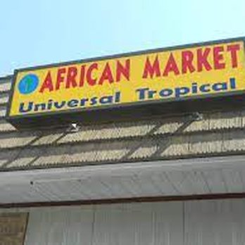 Universal Tropical Market - a sign on the side of a building - Music & DVDs Near Me - Gladstone, Missouri Universal Tropical Market - a sign on the side of a building - Music & DVDs Near Me - Gladstone, Missouri
