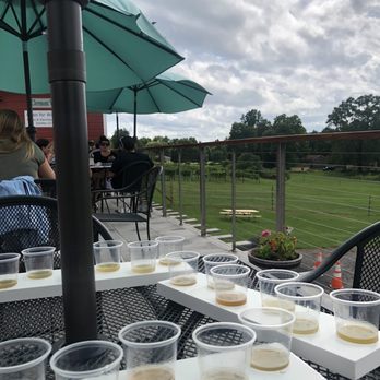 Clermont Vineyards & Winery - White flights on patio - Wine Tasting Room Near Me - Germantown, New York Clermont Vineyards & Winery - White flights on patio - Wine Tasting Room Near Me - Germantown, New York