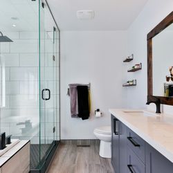 Ed's Renovation - Complete bathroom remodel featuring custom tile work, walk-in shower, and updated plumbing. Done with care, like it's our own home.