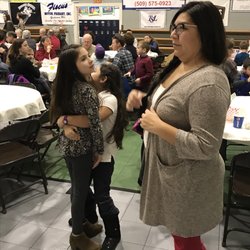 St Joseph-Marquette Catholic School - Parents, teachers and volunteers working the fish fry.