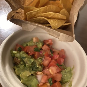 Coyo Taco - 2 tablespoons of guac and hand full of chips $10 - Mexican Near Me - Miami, Florida
