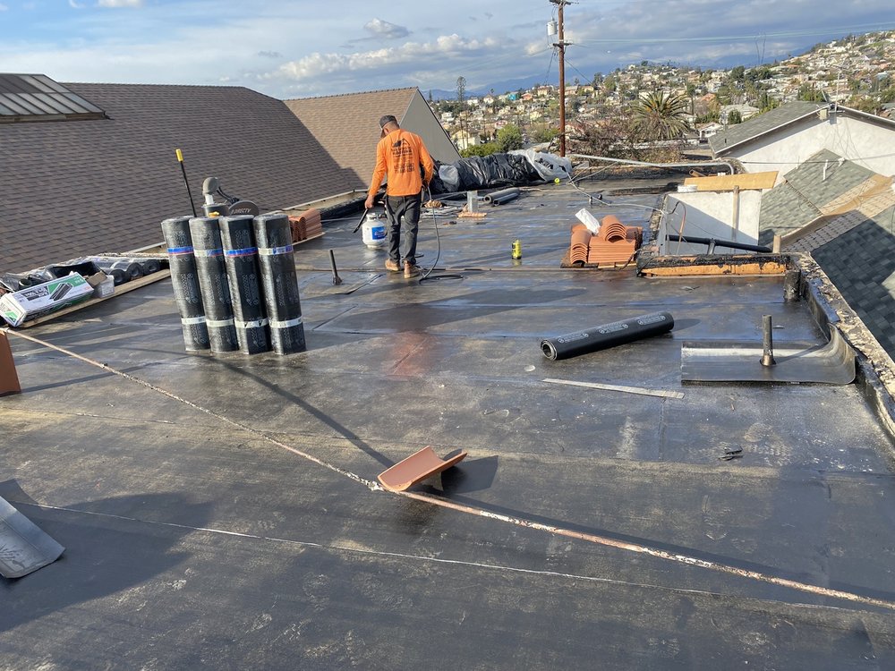 Slide of MA Rain Gutters