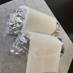 Coneys-N-More - Dogs wrapped in foil