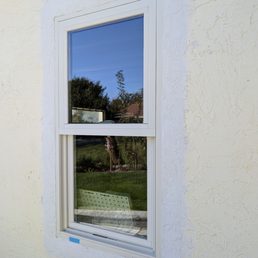 New window, painting the whole house so the new stucco is only primed. New window, painting the whole house so the new stucco is only primed.