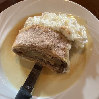 Old House Cosmopolitan Grill - Apfelstrudel with vanilla sauce and whipped cream - German Near Me - Alexandria, Virginia Old House Cosmopolitan Grill - Apfelstrudel with vanilla sauce and whipped cream - German Near Me - Alexandria, Virginia