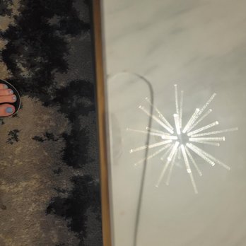 Jeeves Florida Rentals - Broken glass on coffee table - Vacation Rentals Near Me - Kissimmee, Florida