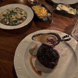 Filet Mignon with pepper corn sauce with sides of Whipped Garlic Mash, Truffle Mac and Cheese, and risotto. Filet Mignon with pepper corn sauce with sides of Whipped Garlic Mash, Truffle Mac and Cheese, and risotto.
