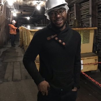 Lackawanna County Coal Mine Tour - Posing with the mandatory helmet and the car we came down in - Tours Near Me - Scranton, Pennsylvania Lackawanna County Coal Mine Tour - Posing with the mandatory helmet and the car we came down in - Tours Near Me - Scranton, Pennsylvania