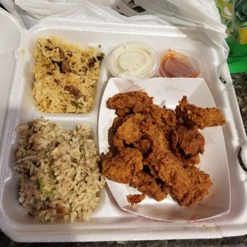 Leo's Cajun Corner - Oyster plate with jambalaya and rice dressing - Cajun/Creole Near Me - Galveston, Texas Leo's Cajun Corner - Oyster plate with jambalaya and rice dressing - Cajun/Creole Near Me - Galveston, Texas