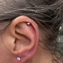 My new first lobe piercing and new jewelry on my helix. JUST done so still a little red! That's normal! My new first lobe piercing and new jewelry on my helix. JUST done so still a little red! That's normal!