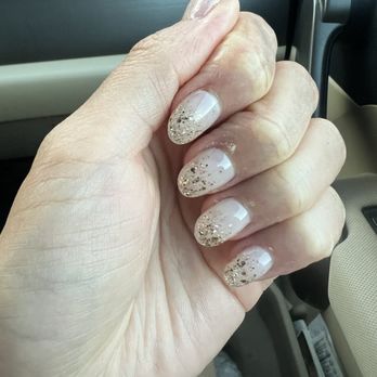 Elle Nails Spa - Gold glitter nail art on top of Gel-X nails - view under natural light - Nail Salons Near Me - Los Angeles, California Elle Nails Spa - Gold glitter nail art on top of Gel-X nails - view under natural light - Nail Salons Near Me - Los Angeles, California