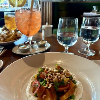 Memoir - Beet salad and moonwalk cocktail... Background is carpaccio...Devine! - American Near Me - Omaha, Nebraska