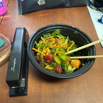 Honeyfish Poke - a bowl of food and chopsticks - Poke Near Me - Thousand Oaks, California Honeyfish Poke - a bowl of food and chopsticks - Poke Near Me - Thousand Oaks, California