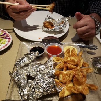 Mandarin King - paper wrapped chicken are much larger and juicier than average. Cream cheese wontons are great. - Chinese Near Me - Laguna Beach, California Mandarin King - paper wrapped chicken are much larger and juicier than average. Cream cheese wontons are great. - Chinese Near Me - Laguna Beach, California