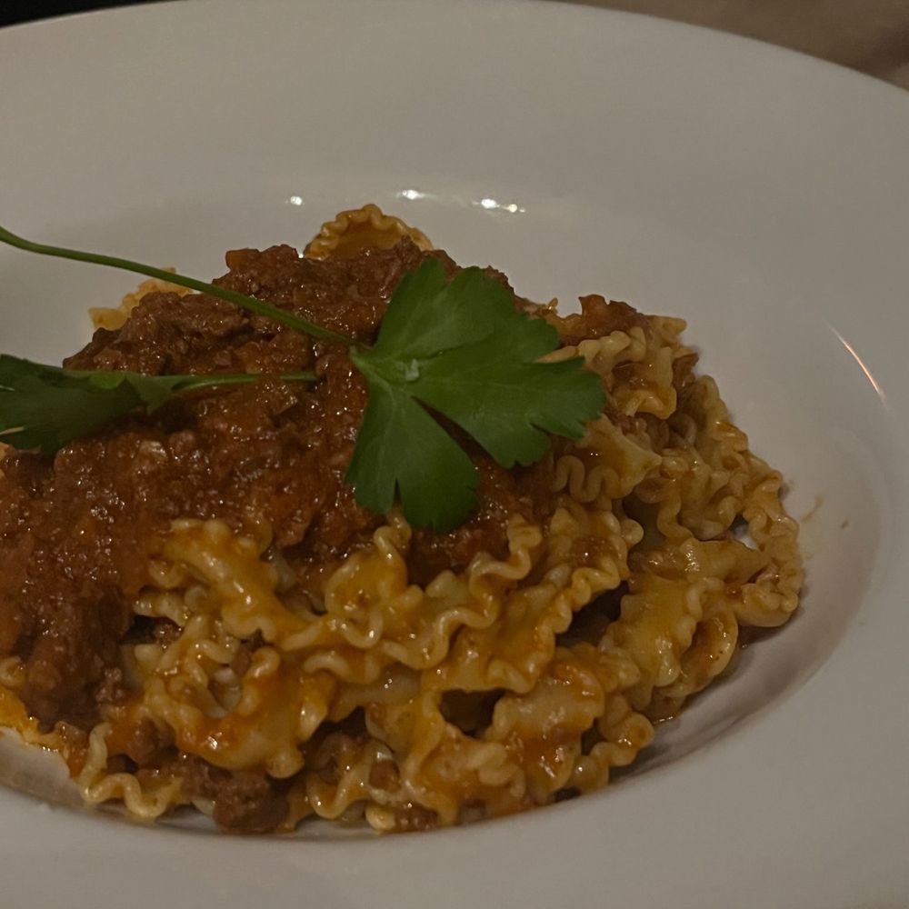 Carmine's - Ribbons Bolognese - Italian Near Me - Chicago, Illinois Carmine's - Ribbons Bolognese - Italian Near Me - Chicago, Illinois