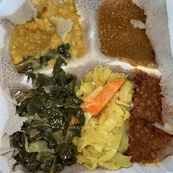Sheba Ethiopian Restaurant - Vegetarian Combo Kay Misir (Red lentils) Ater Kirk (Yellow split peas) Gomen (greens) Tikil Gomen (Cabbage & carrots) Shiro (Chickpea stew) - Ethiopian Near Me - Rockville, Maryland Sheba Ethiopian Restaurant - Vegetarian Combo Kay Misir (Red lentils) Ater Kirk (Yellow split peas) Gomen (greens) Tikil Gomen (Cabbage & carrots) Shiro (Chickpea stew) - Ethiopian Near Me - Rockville, Maryland