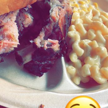 Dee Willie's BBQ - Ribs, Mac n Cheese, Cream Corn and there is Marbled Brisket under the bread. - Barbeque Near Me - San Antonio, Texas