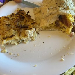 Pork monster burrito smothered in sausage gravy!!!! I mean... what??? Pork monster burrito smothered in sausage gravy!!!! I mean... what???
