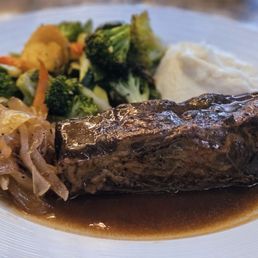 Steak with mashed potatoes and a brown gravy that absolutely made the steak pop! Steak with mashed potatoes and a brown gravy that absolutely made the steak pop!