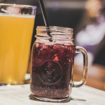 The Terminal Pub - a mason jar with a straw and a drink - Pubs Near Me - New Westminster, British Columbia The Terminal Pub - a mason jar with a straw and a drink - Pubs Near Me - New Westminster, British Columbia