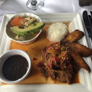 The Cuban - Ropa vieja dish, rice beans and a side order of chicken soup. - Cuban Near Me - Patchogue, New York The Cuban - Ropa vieja dish, rice beans and a side order of chicken soup. - Cuban Near Me - Patchogue, New York