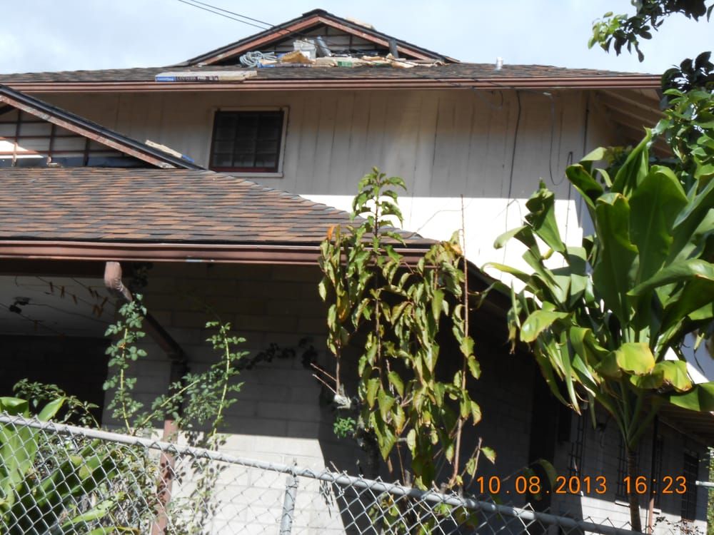 Slide of R.S. Toyama Roofing Service