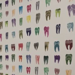And how could you not feel warm and fuzzy about this adorable tooth wallpaper in the restroom. The aesthetics